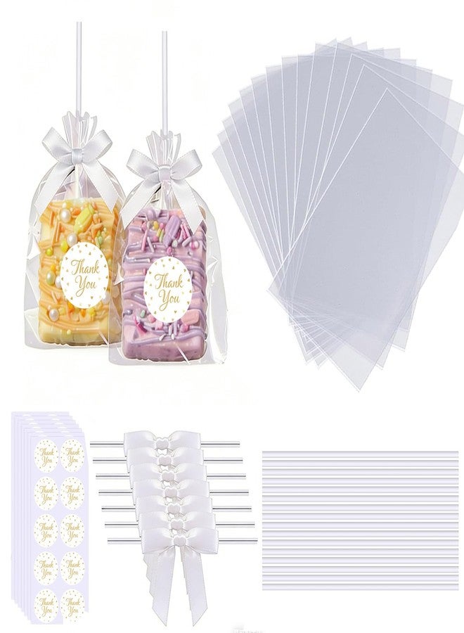 Treayes 100PCS Clear Rice Krispie Treat Bags with Ribbon Bow and Thank You Stickers, Flat Cellophane Bags for Individually Wrapped Cake Pops, Cakesicles,Candies, Chocolates, Marshmallow, Macarons, Cookies(White) - Image 1